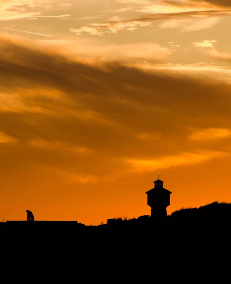 Langeooger Wasserturm im Sonnenuntergang